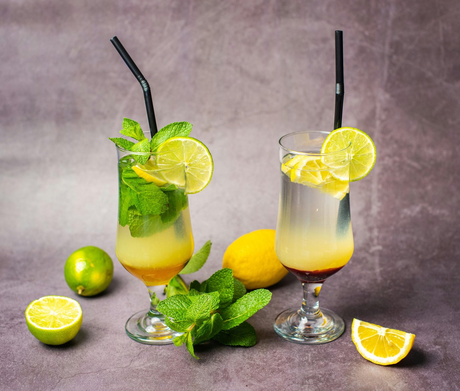 Deliciously refreshing lemon and mint beverages with fresh ingredients on display.